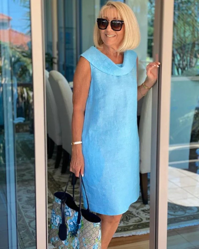 Elegantes Damen Freizeitkleid, ärmellos, mit weitem Ausschnitt. Ideal als Strandkleid für festliche Sommermode.