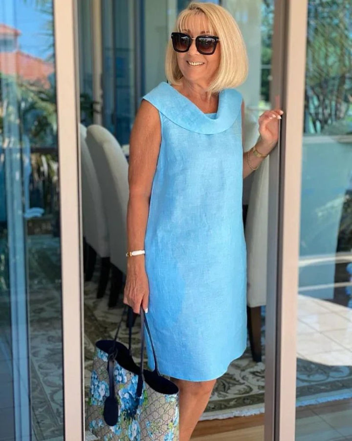 Elegantes Damen Freizeitkleid, ärmellos, mit weitem Ausschnitt. Ideal als Strandkleid für festliche Sommermode.