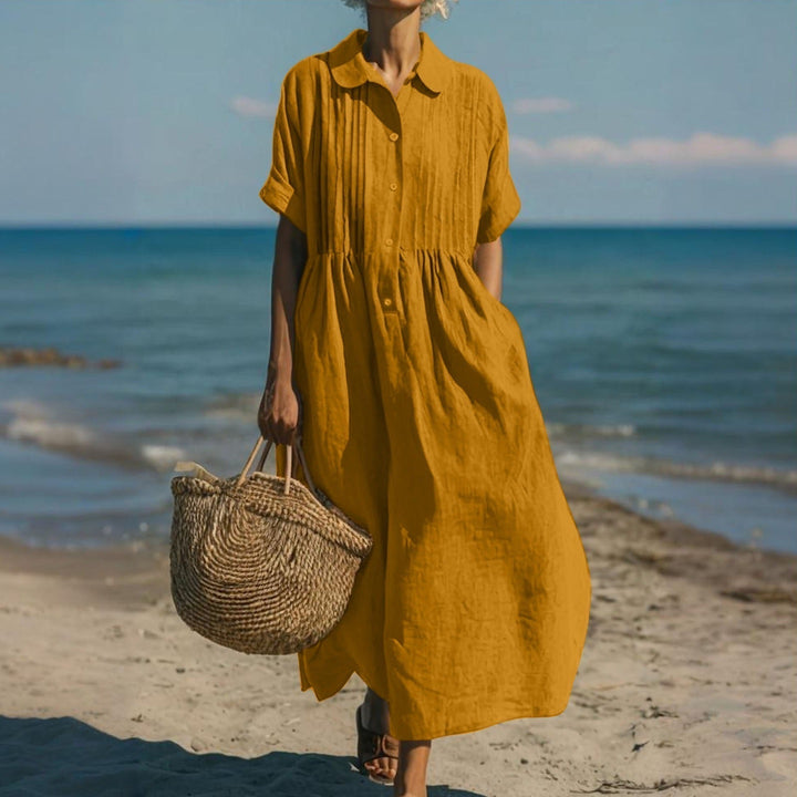 Elegantes Damen Maxikleid in fließender Passform mit Pintuck-Akzenten, ideal für warme Tage.