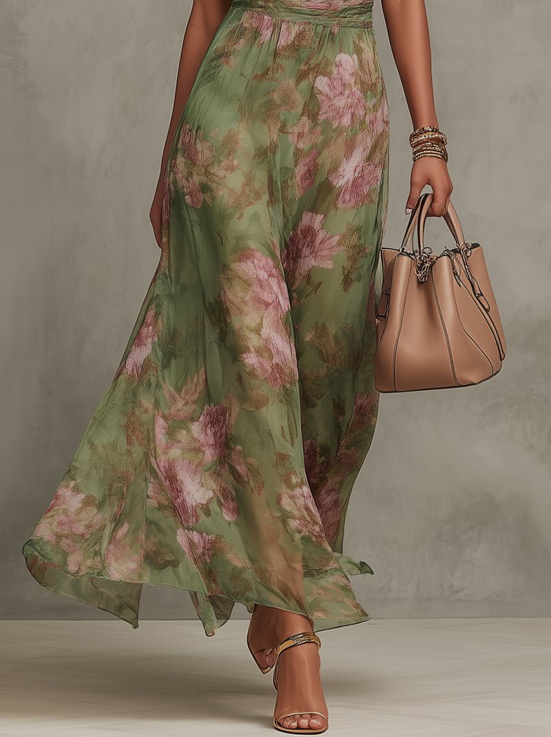 Rosafarbenes, elegantes Damen Maxikleid mit Neckholder und detailreichem Blumenmuster für festliche Sommerabende.