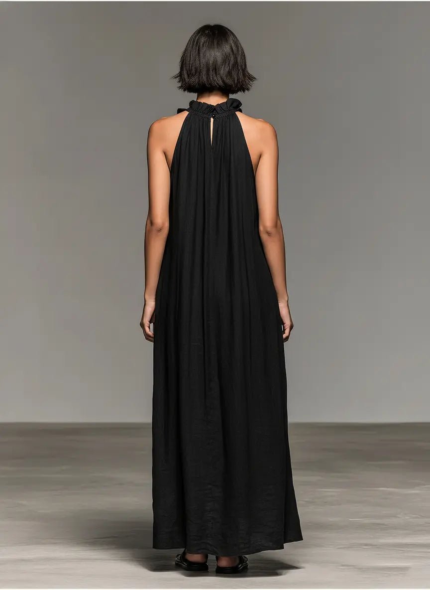 Schickes, ärmelloses Damen Maxikleid mit eleganten Rüschen für den Sommer. Lang, luftig & bequem.