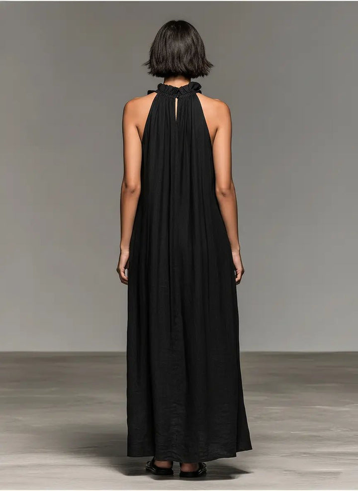 Schickes, ärmelloses Damen Maxikleid mit eleganten Rüschen für den Sommer. Lang, luftig & bequem.