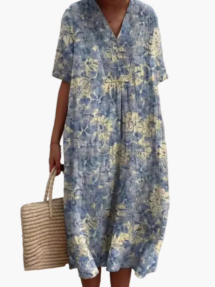 Blumiges Damen Freizeitkleid, knielang, locker fallend, perfekt für entspannte Sommertage.