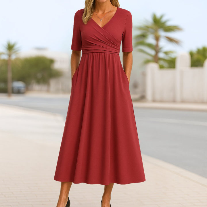 Marineblaues Damen Wickelkleid in A-Linie, kurzärmelig, V-Ausschnitt, ideal als Büro- oder Sommerkleid.