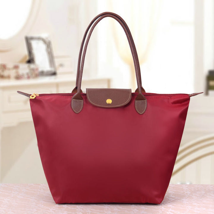 Großzügige Oxford Damentasche. Stilvolle, praktische Schultertasche mit viel Stauraum für den Alltag.