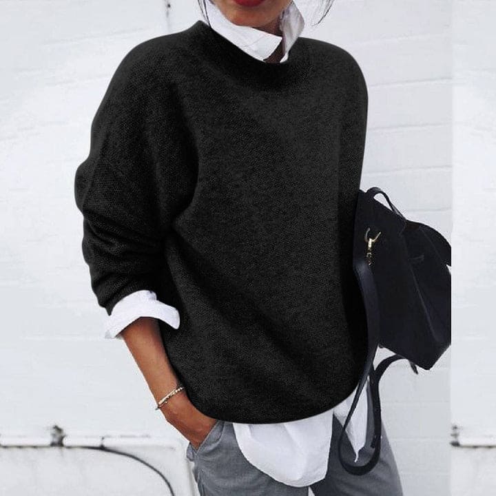 Stylischer Damen Herbstpullover kombiniert mit Jeans; vielseitiger, gemütlicher Strickpullover für elegante Looks.
