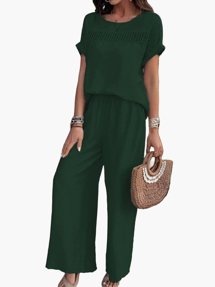 Vielseitiger Damen Sommer Jumpsuit. Freizeitmode & eleganter Look dank lockerem Schnitt, weiten Beinen, Häkel-Detail.