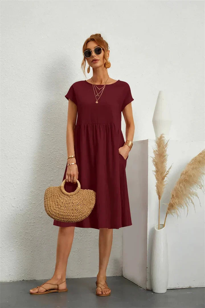 Komfortables Damen Kurzarmkleid, Rundhals & Taschen, als Alltagskleid oder elegantes Urlaubskleid vielseitig tragbar.