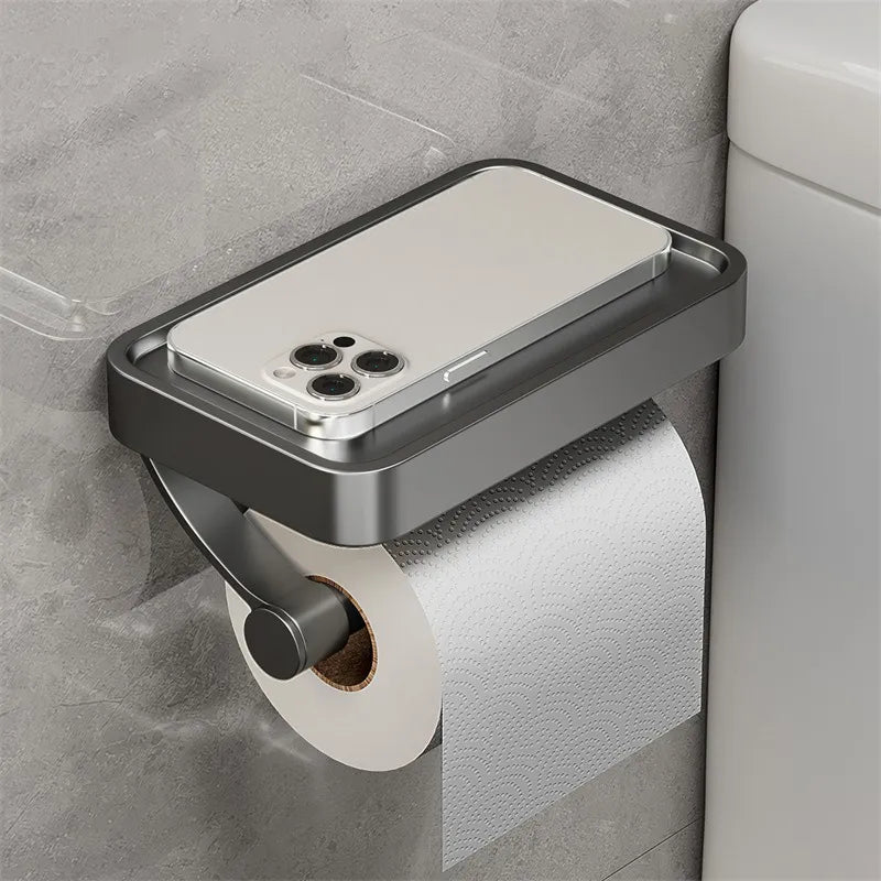 Robuster Toilettenpapierhalter aus Edelstahl mit vielseitiger Ablagefläche. Einfache Wandmontage für das Bad.