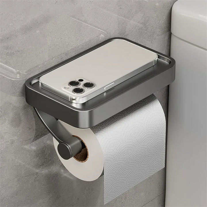 Robuster Toilettenpapierhalter aus Edelstahl mit vielseitiger Ablagefläche. Einfache Wandmontage für das Bad.