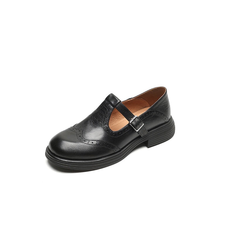 Komfortable flache Damen Mary Janes mit rutschfester Sohle und verstellbarem Riemen. Eleganter Alltagsschuh.