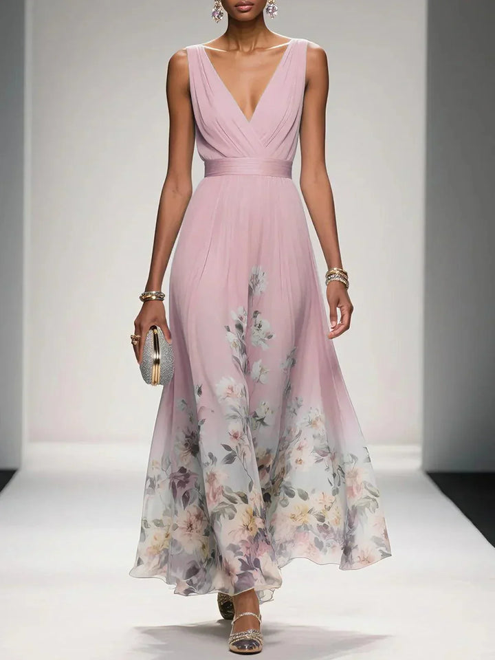 Damen Maxikleid mit floralem Muster, elegant schwingend. Perfekt als Freizeitkleid oder schickes Urlaubskleid.