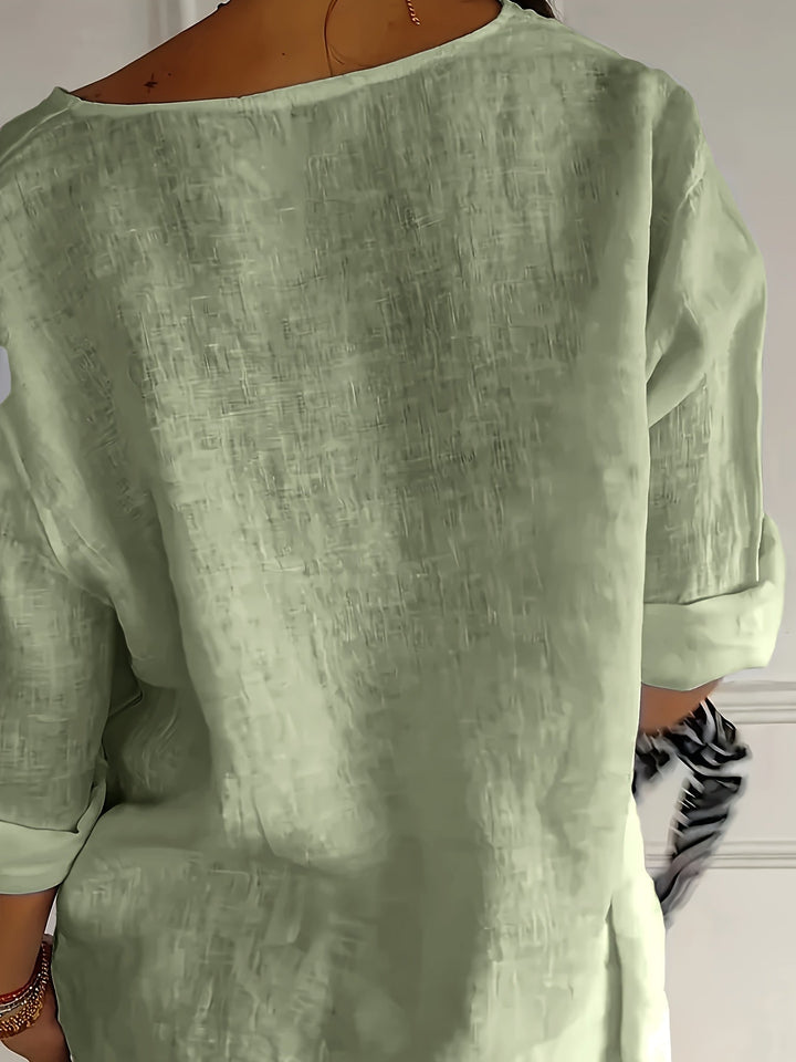 Casual Damen Bluse mit V-Ausschnitt und lockerer Passform, vielseitig für Freizeit & Sommer.
