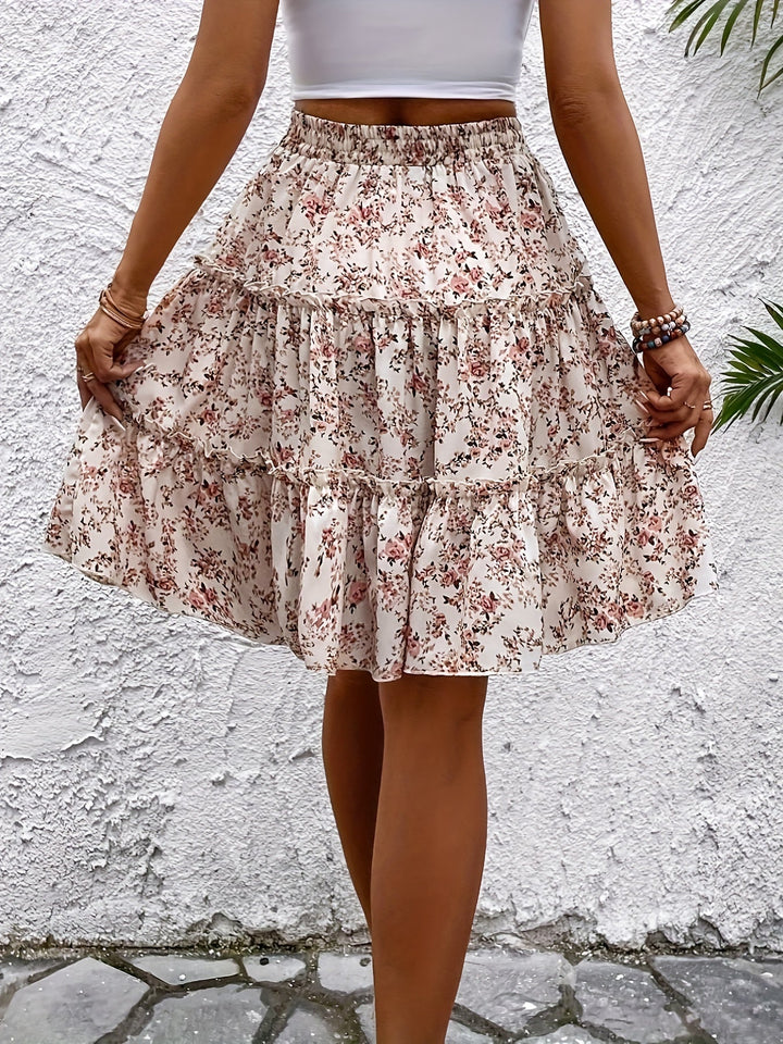 Eleganter, fließender Damen Midirock in Rosa mit Volant und Blumenmuster; ideal als Urlaubs- & Sommerrock.