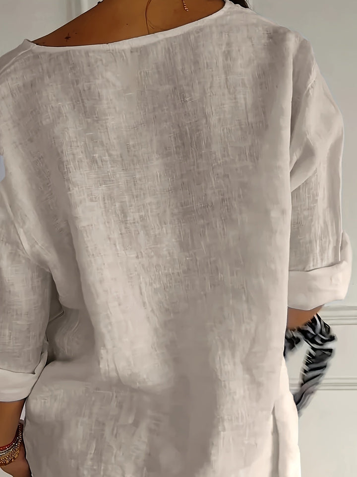 Damen Bluse mit V-Ausschnitt & 3/4-Ärmeln, perfekt kombinierbar, stilvoll für Business & Casual.