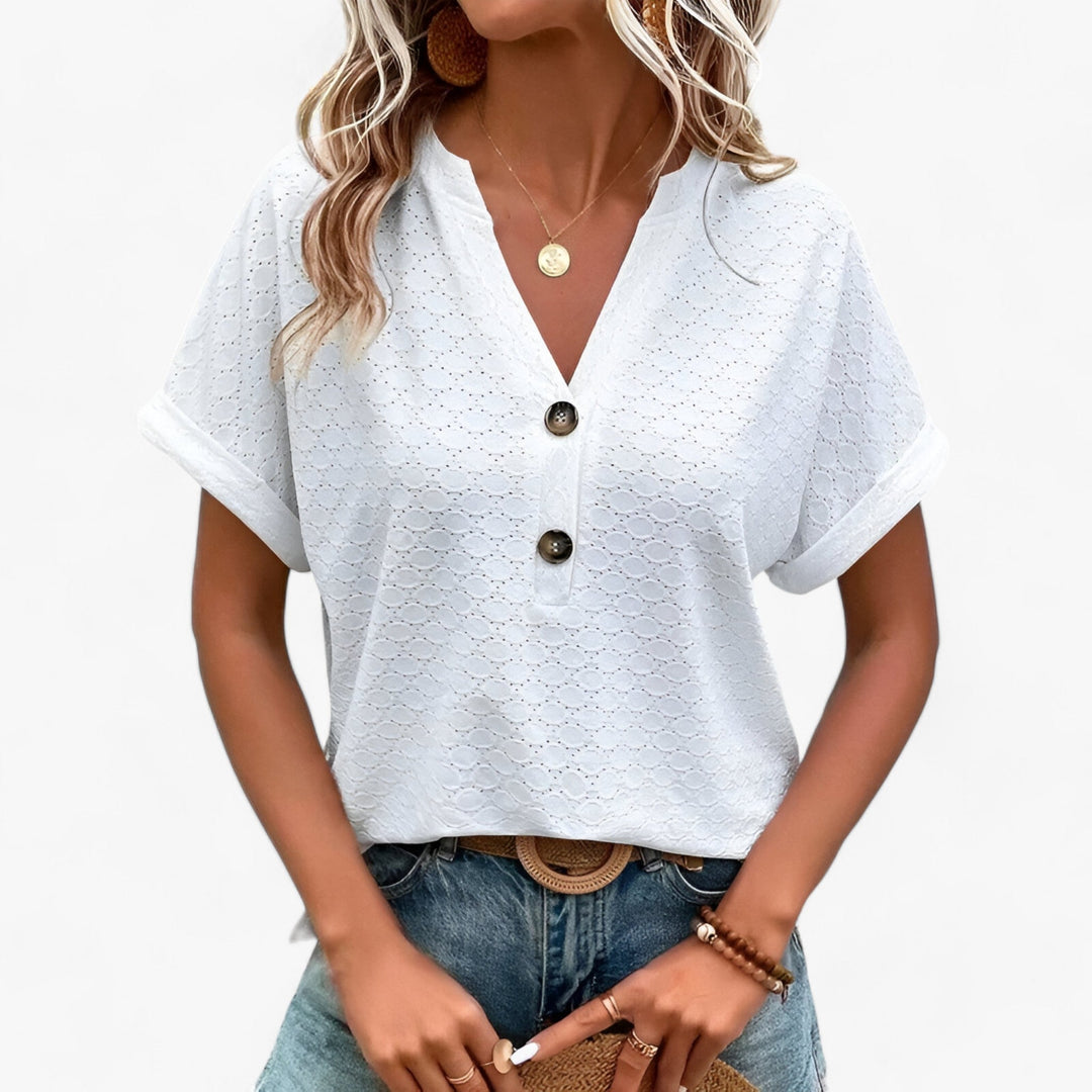 Feminine Damenbluse mit floralem Muster, V-Ausschnitt, pflegeleicht & luftig für Frühling und Sommer.