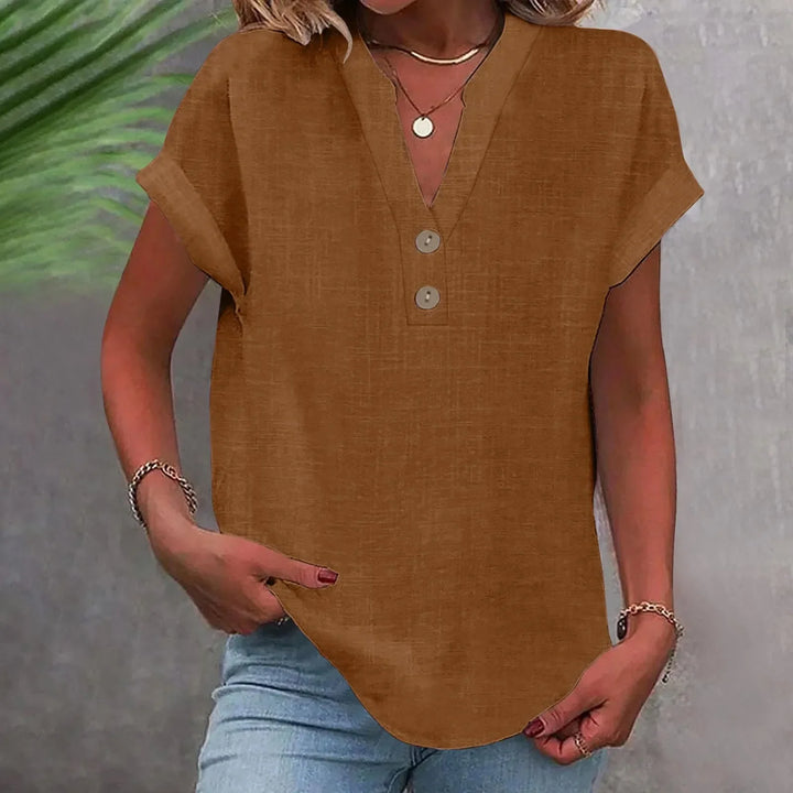 Vielseitige Damenbluse in Blau mit V-Ausschnitt & Knöpfen. Ideal für Casual Chic & Büro-Outfits.