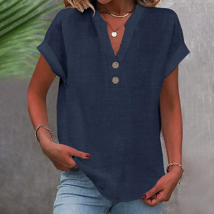 Damen Oberteil mit V-Ausschnitt & Knöpfen, perfekt kombiniert mit einer Hose. Elegant & bequem.