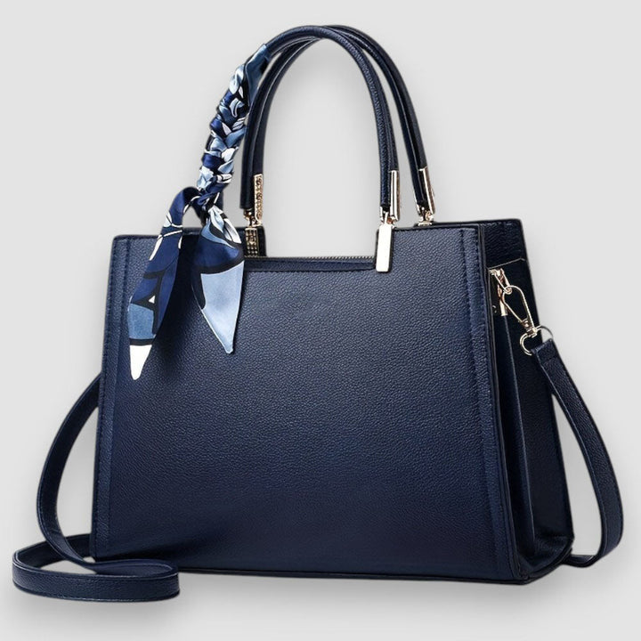 Rote elegante Damenhandtasche, stilvoll & zeitlos, ein klassisches Fashion-Statement für modebewusste Frauen.