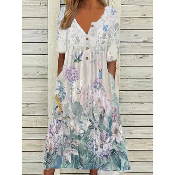 Bequemes, leichtes Damen Kurzarmkleid mit elegantem Blumendruck, perfekt für den Sommer.