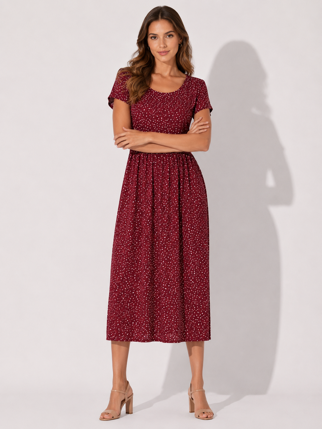 Damen A-Linie Pünktchenkleid, Midilänge, kurzarm. Schickes & bequemes Sommerkleid, ideal für elegante Auftritte.