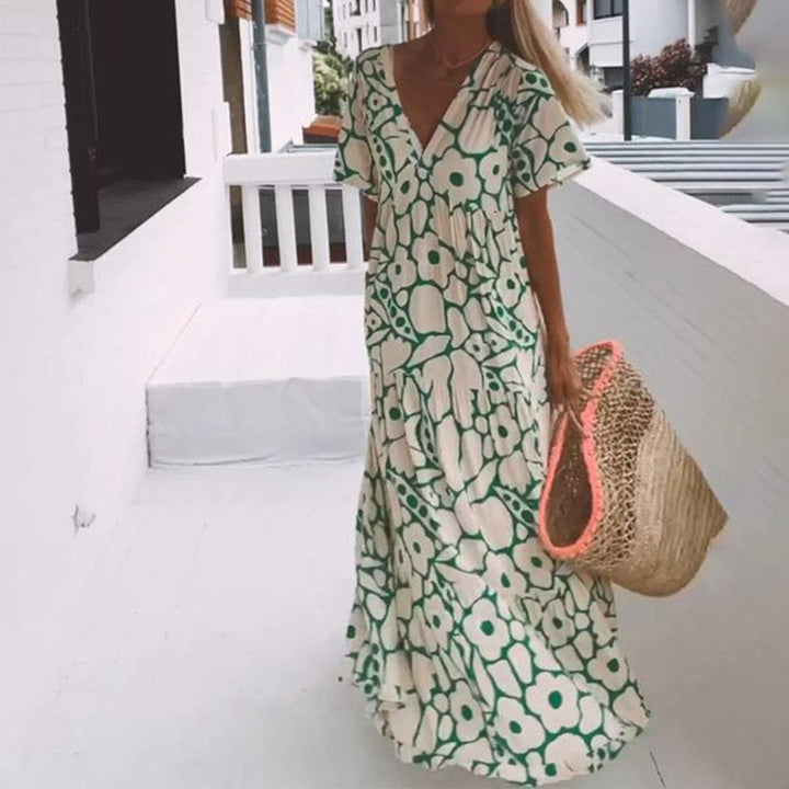 Damen Eleganz: Boho Maxikleid, geblümt, mit V-Ausschnitt und Flügelärmeln. Ideal als Sommerkleid & Strandmode.