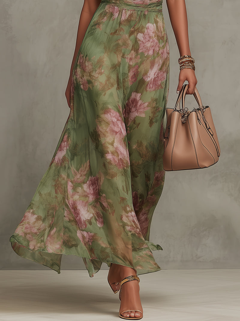 Fließendes, elegantes Damenkleid mit Blumenmuster, auch als festliches Frühjahrskleid geeignet.