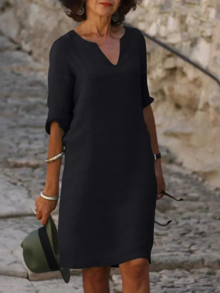 Fließendes Damen Sommerkleid mit V-Ausschnitt, ideal als elegantes Freizeit- & Abendkleid.