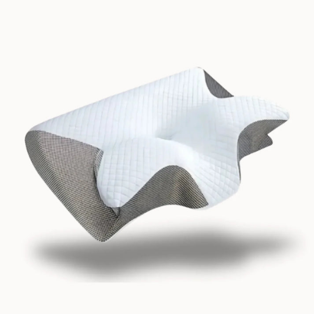 Ergonomisches Schlafkissen auf einem Bett, perfekt für Nacken- und Schulterkomfort, ideal für entspannten Schlaf.
