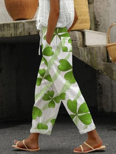 Elegante Damen-Herbsthose mit floralem Muster & weitem Bein. Vielseitige Freizeithose mit bequemem elastischem Bund.
