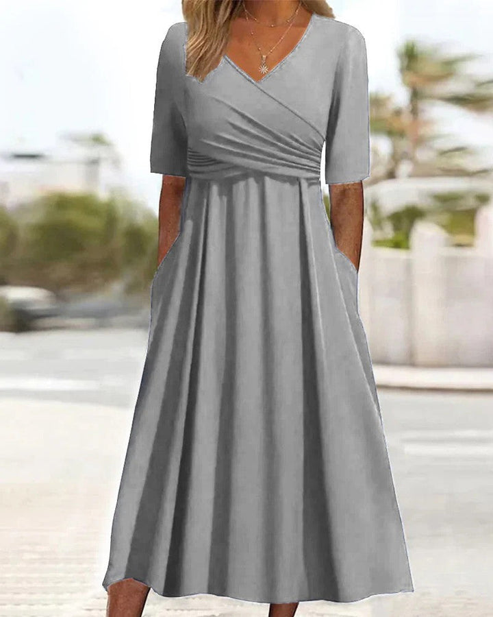 Vielseitiges Damen Midi Kleid mit Ärmeln, elegante Passform für Herbst & Frühling, perfekt als Büro- & Freizeitkleid.