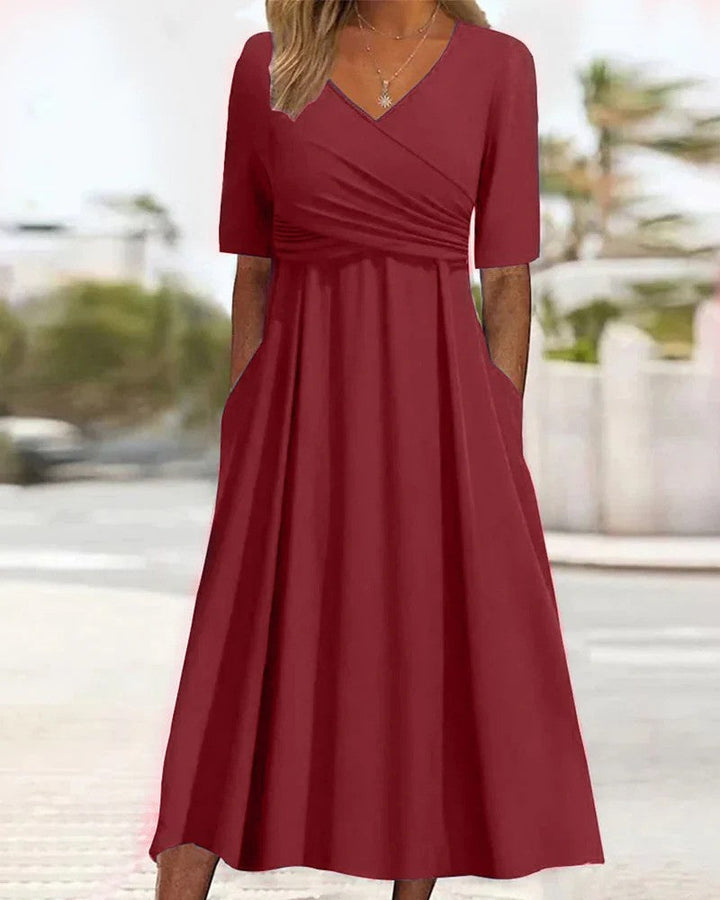 Figurbetontes Damen Midi Kleid mit langen Ärmeln, elegante Mode für Business oder Freizeit im Herbst/Frühling.
