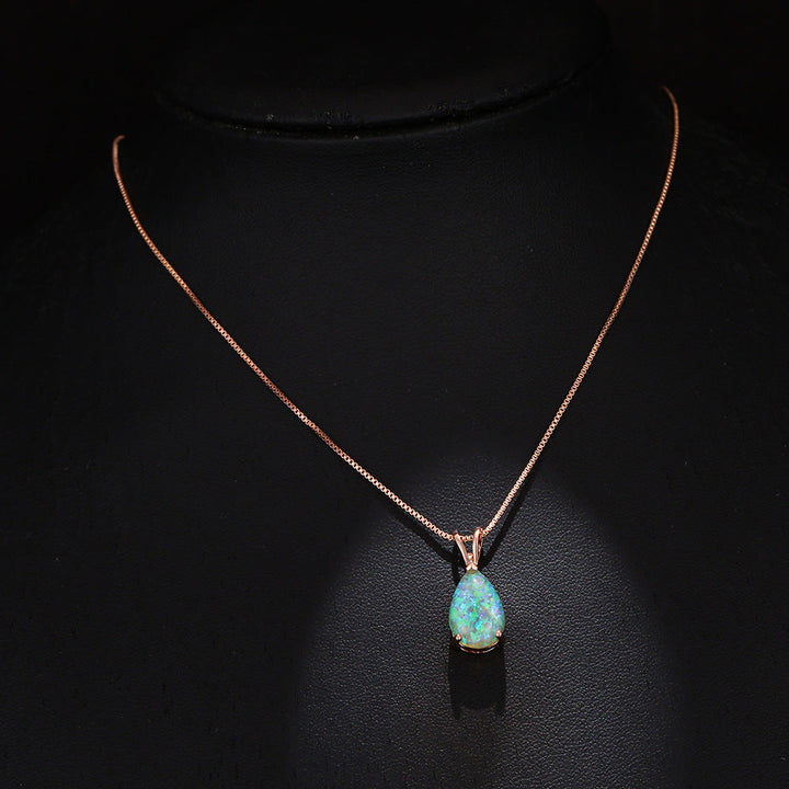 Zeitlose Damen-Halskette mit Opal-Tropfenanhänger, Roségold, hochwertiger Edelsteinschmuck.