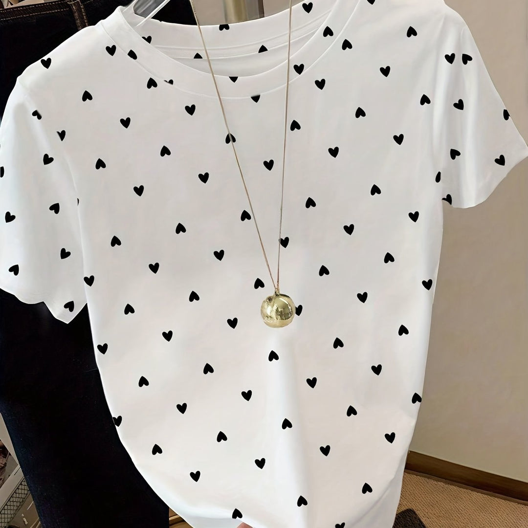Schickes Damen T-Shirt mit Rundhalsausschnitt und allover Punkt-Herz-Print.