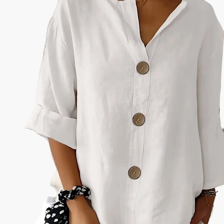 Lässige Damen Sommerbluse mit 3/4-Ärmeln, V-Ausschnitt, Knopfleiste, bequem und atmungsaktiv.