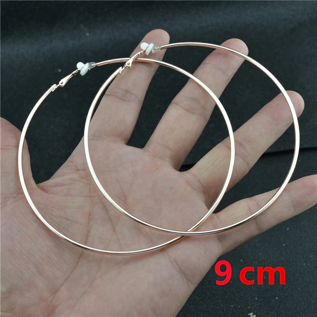 Roségoldene Clip Ohrringe, Damen, Piercing-frei, als charmantes Accessoire für einen femininen Stil.