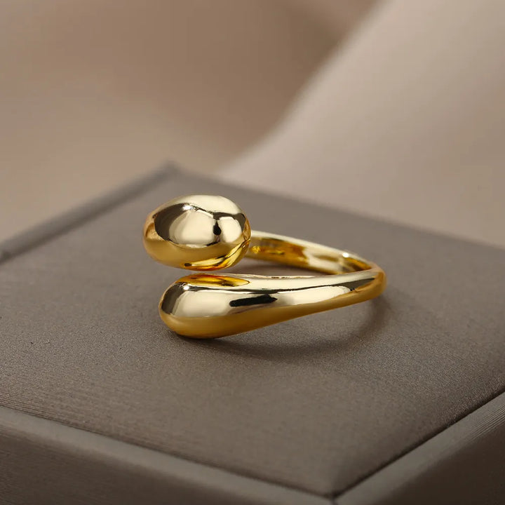 Offener Damenring mit doppelten goldenen Perlen aus Edelstahl. Eleganter, verstellbarer Goldschmuck für Frauen.