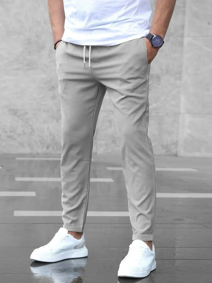 Graue Herren Stretch-Hose: Slim Fit Business & Freizeit, elegant & bequem, ganzjährig tragbar.