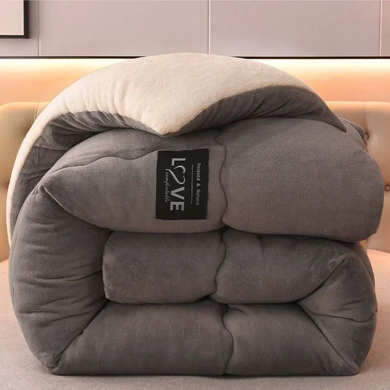 Flauschige Kuscheldecke, atmungsaktiv & warm, ideal als gesteppte Winterdecke für gemütliche Heimtextilien.