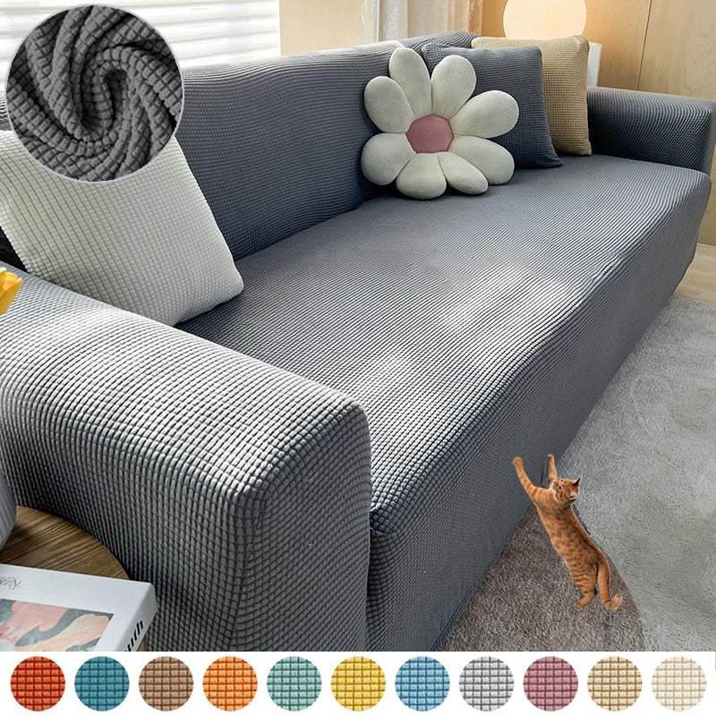 Atmungsaktive Stretch-Sofahusse in Ozeanblau. Angenehme Haptik, schützt & verschönert Ihr Sofa.