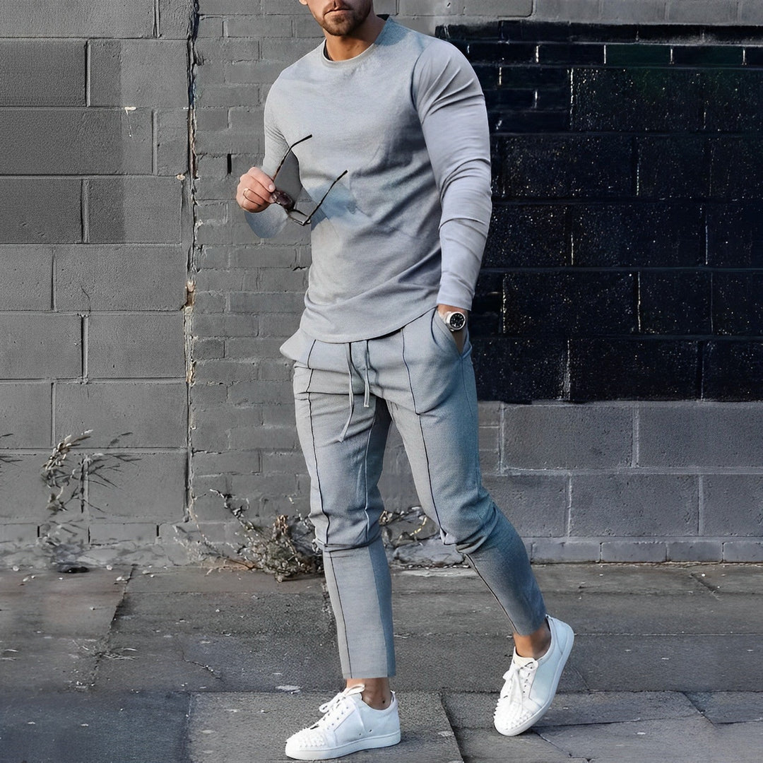 Komfortables Herren Freizeit-Outfit Set: Zweiteiliger Pullover und Jogginghose für entspannte Alltagsmomente.