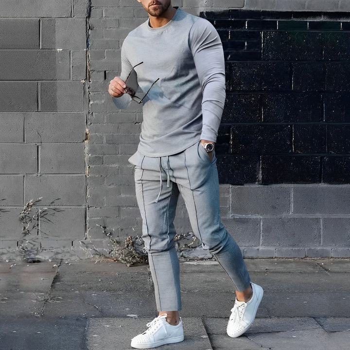 Komfortables Herren Freizeit-Outfit Set: Zweiteiliger Pullover und Jogginghose für entspannte Alltagsmomente.