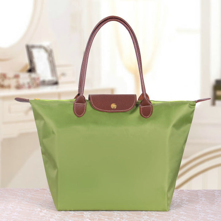 Vielseitige Damen Schultertasche aus Oxford-Stoff. Elegantes Accessoire, ideal für Reise & täglichen Gebrauch.