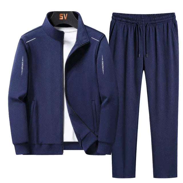 Moderner Herren Trainingsanzug in Grau. Bequemer Zweiteiler für Sport, Freizeit & Alltag. Sportliches Outfit-Set.