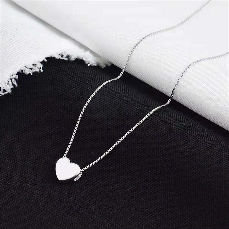 Minimalistische silberne Herzkette für Damen, aus Sterling-Silber, elegant und vielseitig.