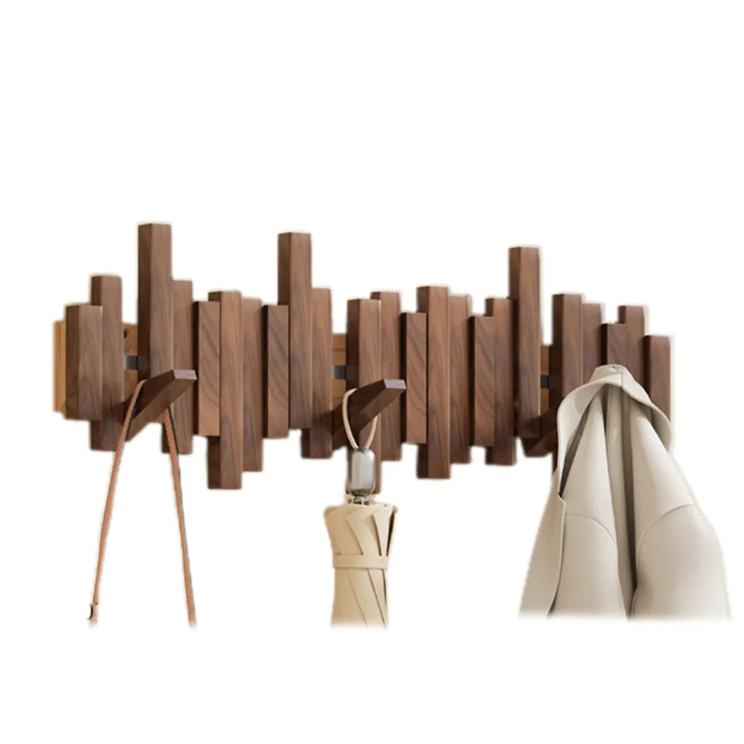 Platzsparende Garderobe aus Holz, Nussbaum & Buche, ideal für einen ordentlichen Eingangsbereich.