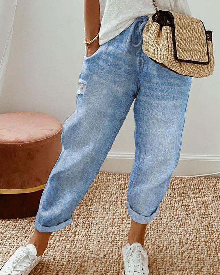 Blaue Damen Jeans mit bequemem Kordelzugbund im Regular Fit, perfekt für einen lässigen Freizeit-Look.