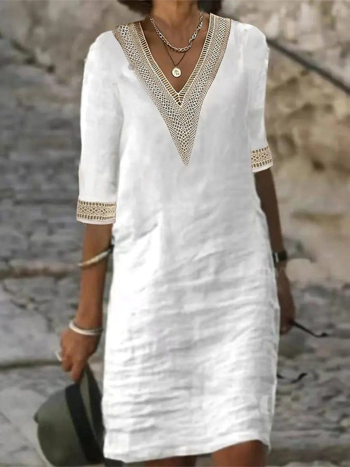 Bequemes Damen Herbstkleid mit stilvollem Spitzen-V-Ausschnitt & 3/4 Ärmeln; ideal als Freizeit- oder Frühlingskleid.