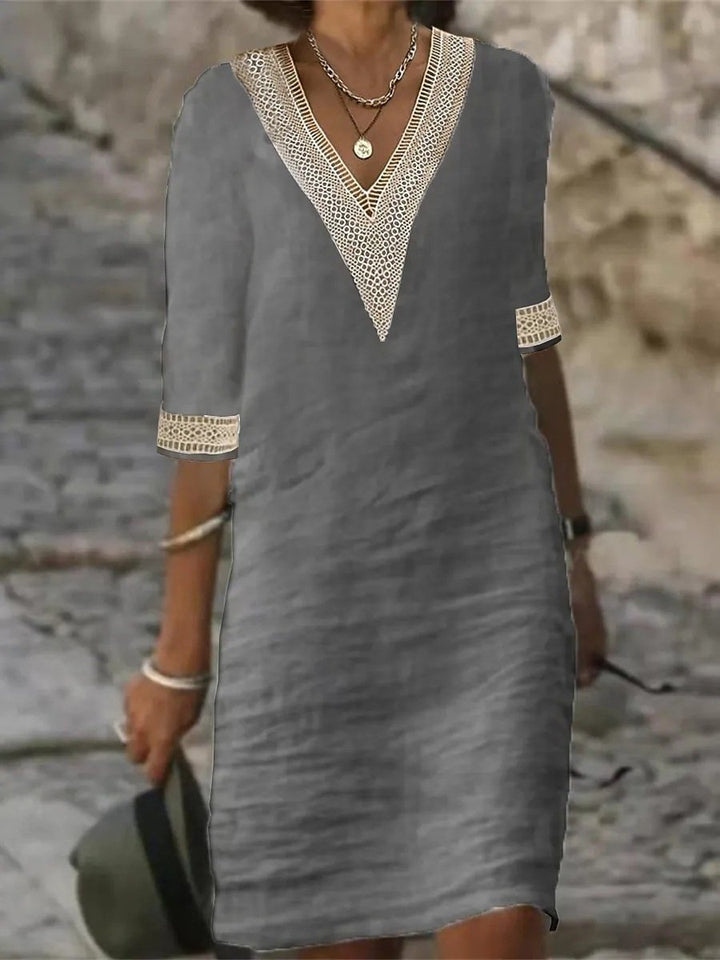 Elegantes Damenkleid für Herbst & Frühling, mit schönem V-Ausschnitt aus Spitze & modischen 3/4 Ärmeln.