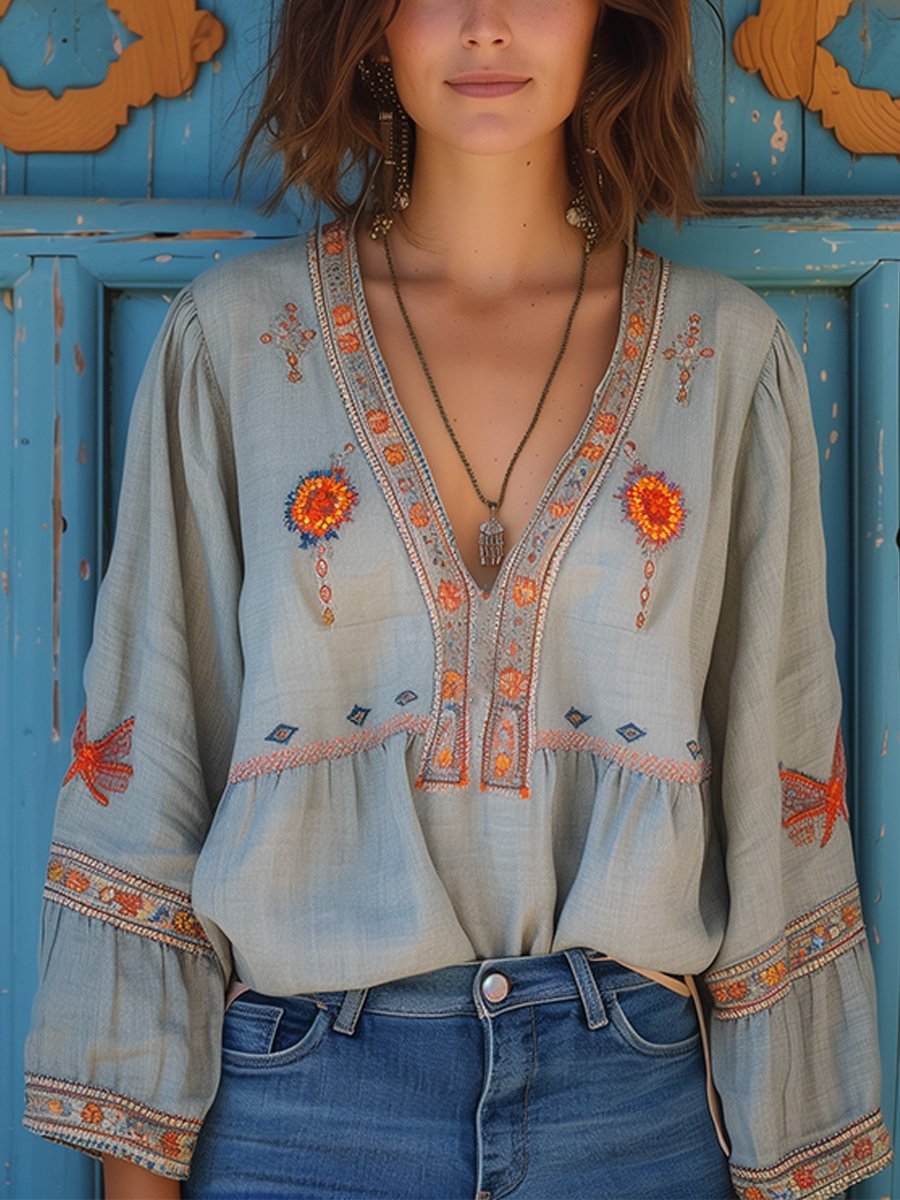 Damen Boho-Bluse mit eleganter Stickerei und V-Ausschnitt für einen leichten Sommer-Look.